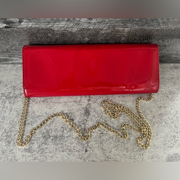 Gorgeous BCBG red patent clutch with gold strap. NWOT - Picture 3 of 5